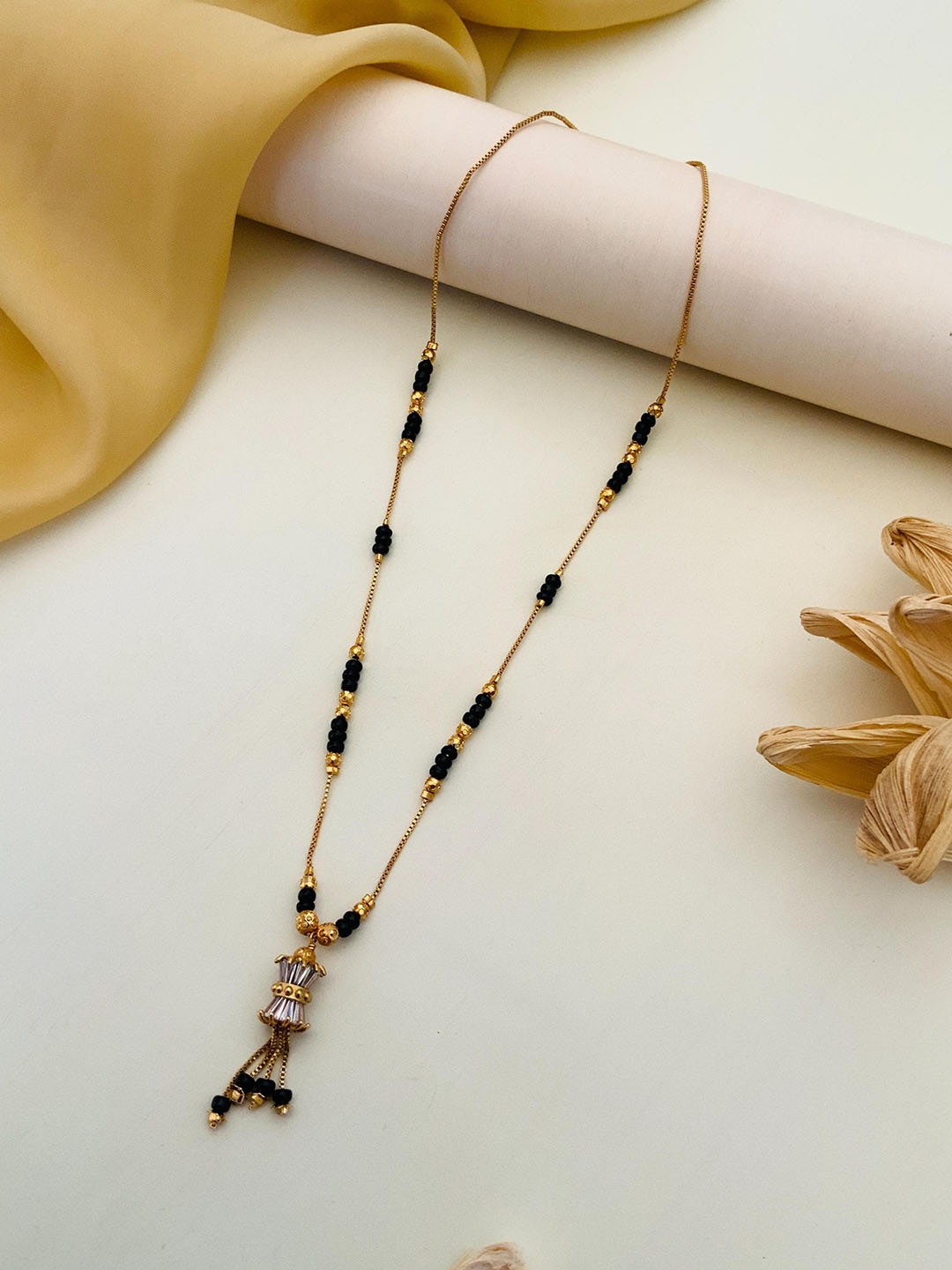 

Anouk Gold-Plated Artificial Stones and Beads Mangalsutra