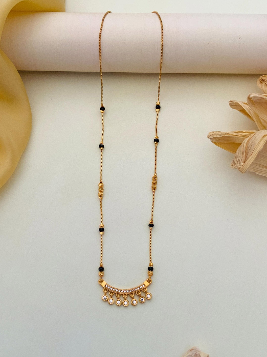 

Anouk Gold-Plated Artificial Stones and Beads Mangalsutra