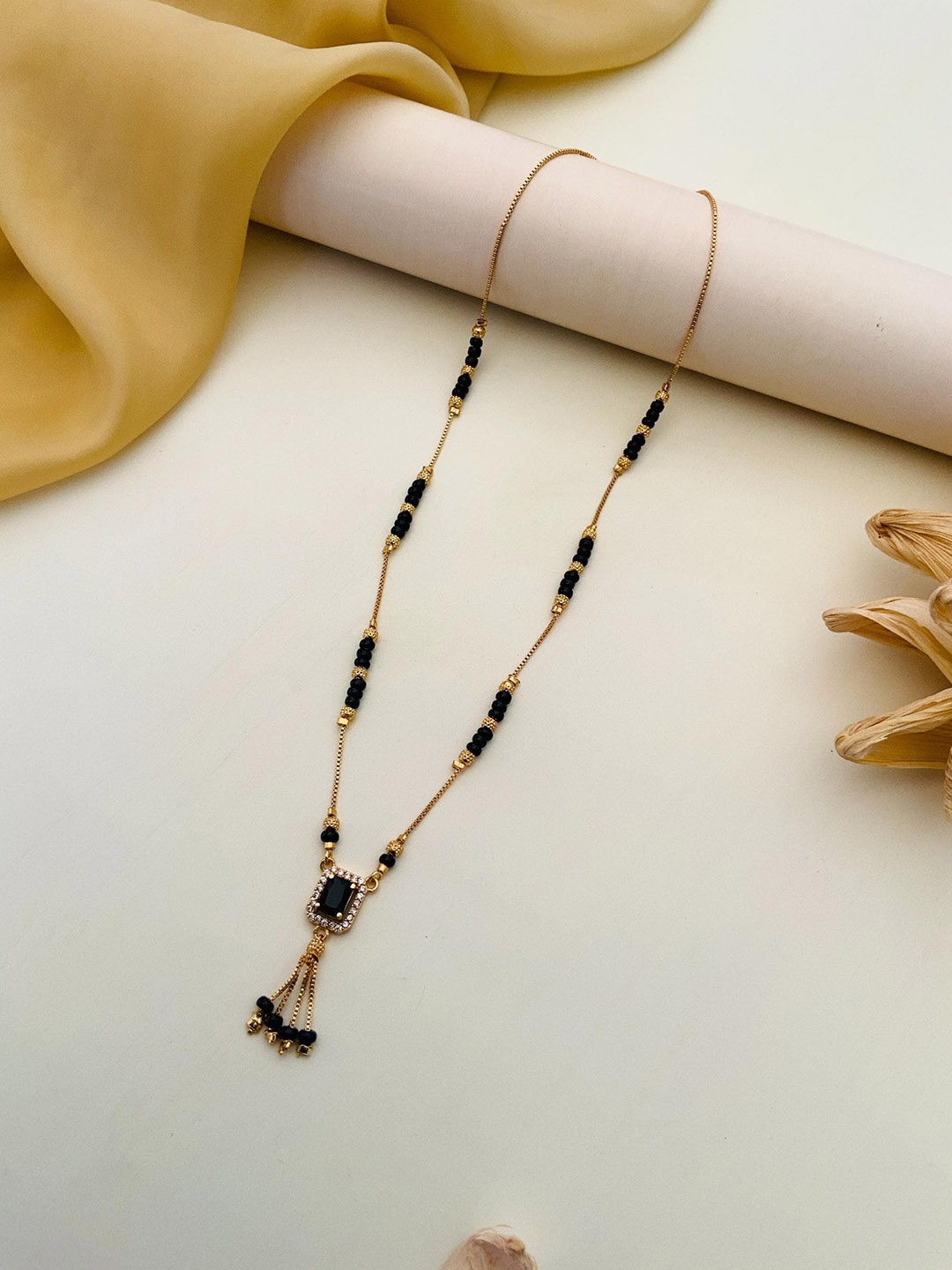 

Anouk Gold-Plated Artificial Stones and Beads Mangalsutra