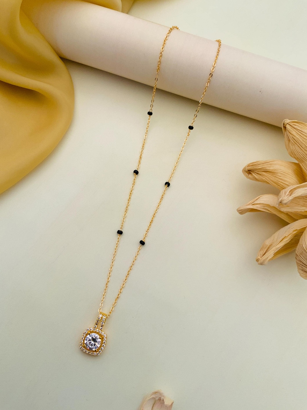 

Anouk Gold-Plated Artificial Stones and Beads Mangalsutra