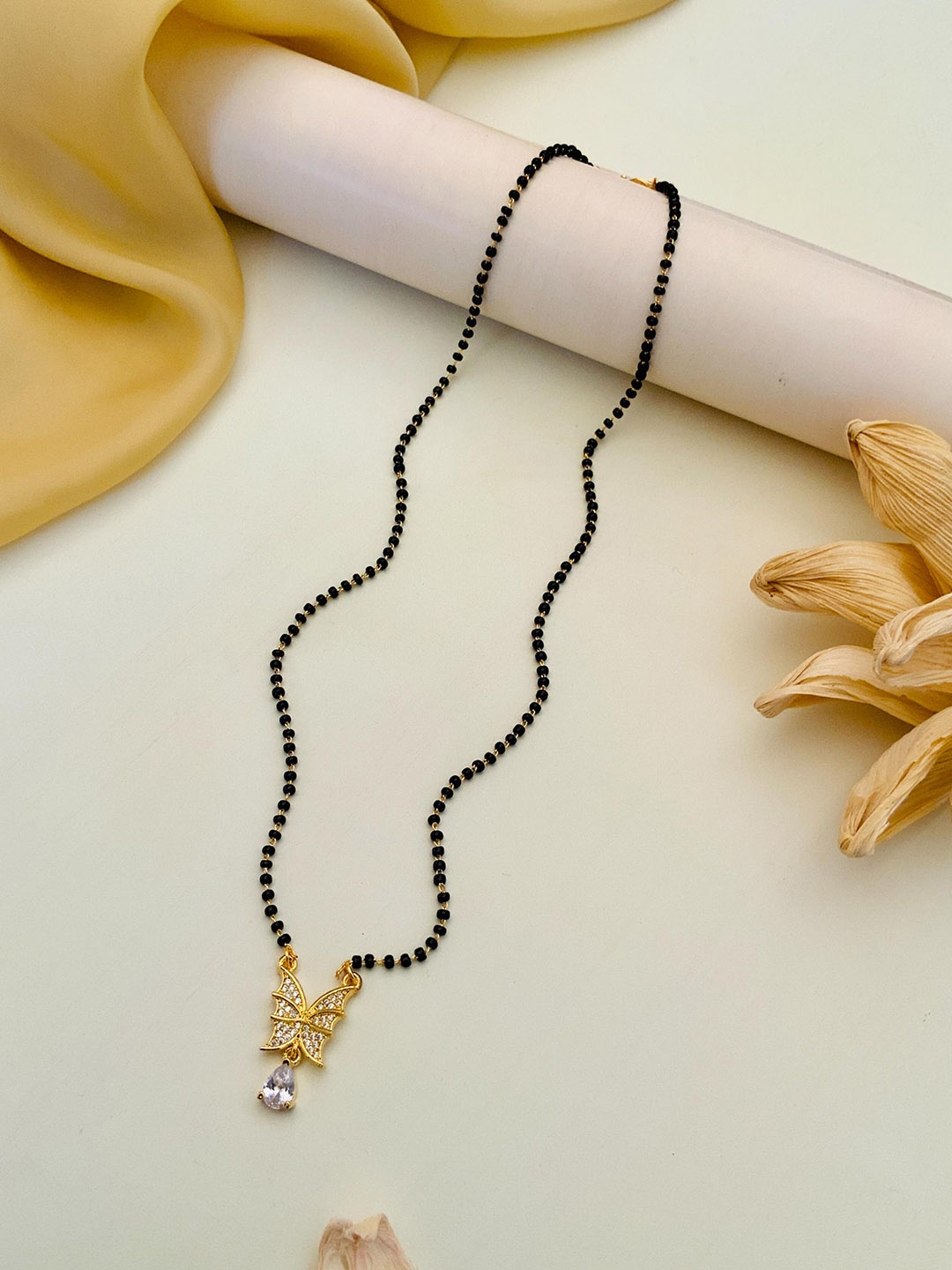 

Anouk Gold-Plated Artificial Stones and Beads Mangalsutra