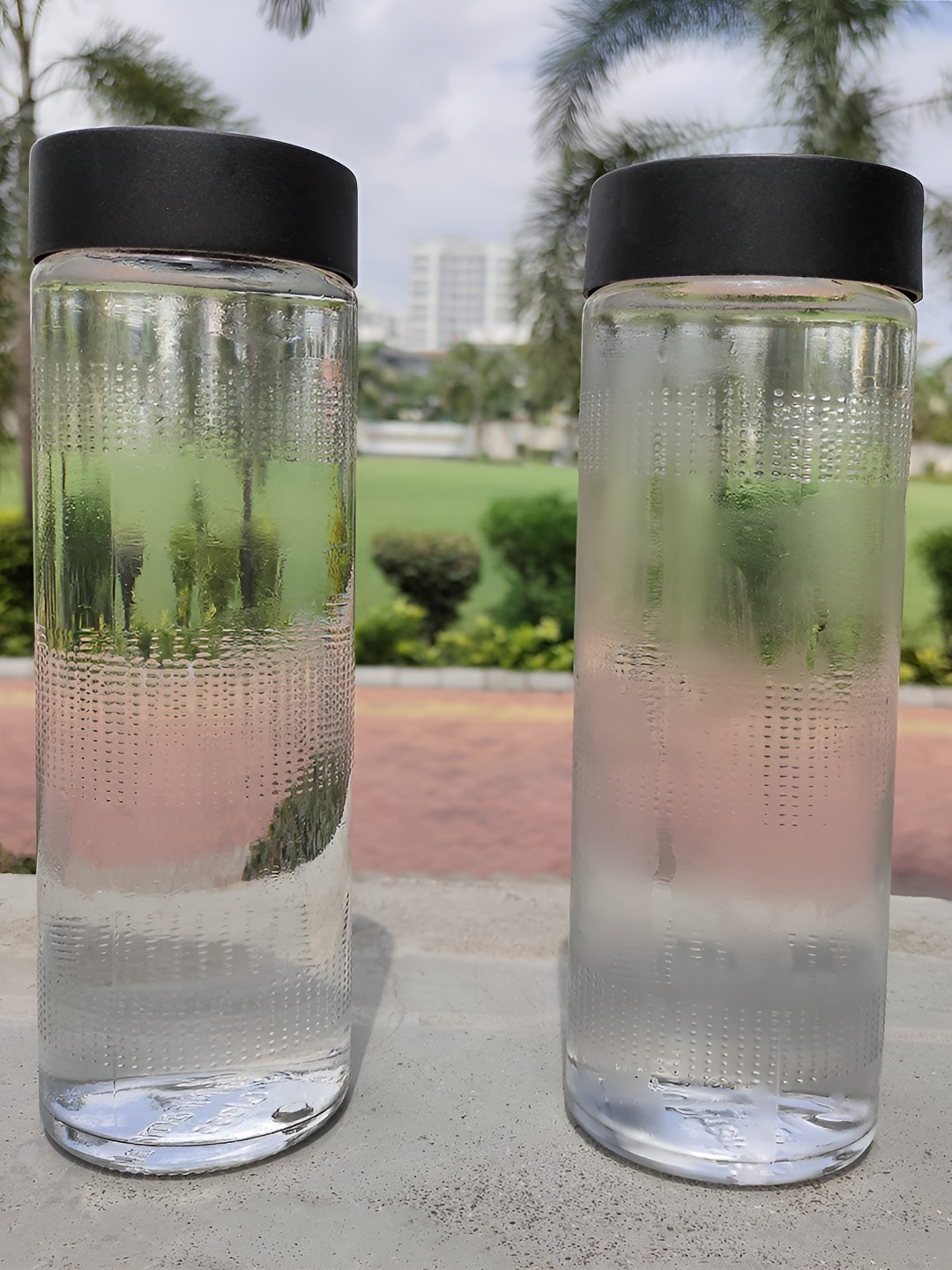 

tyche enterprises Transparent & Black 2 Pcs Glass Water Bottle 750 ml
