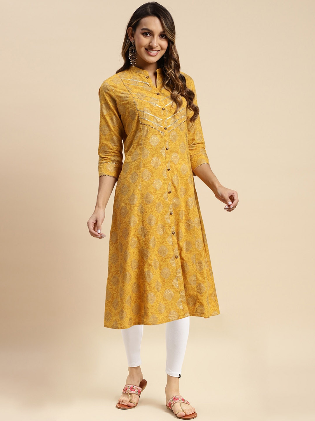 

Rangita Ethnic Motifs Printed Gotta Patti Pure Cotton A-Line Kurta & Leggings, Yellow