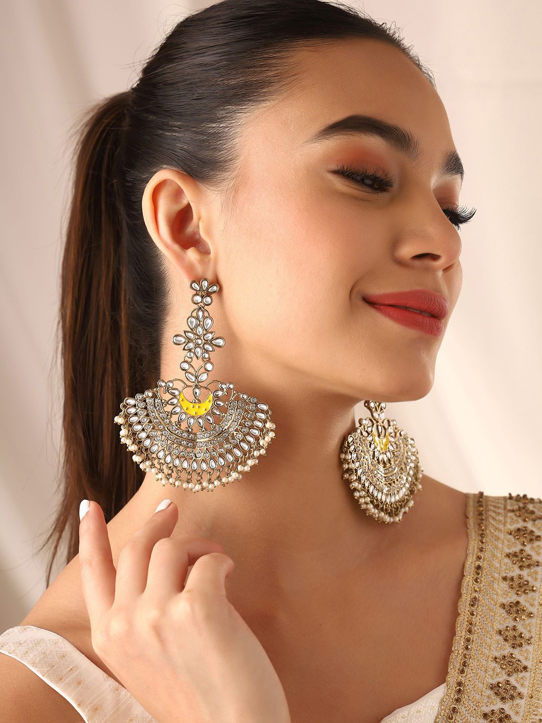 

Priyaasi Brass Gold-Plated Contemporary Chandbalis Earrings
