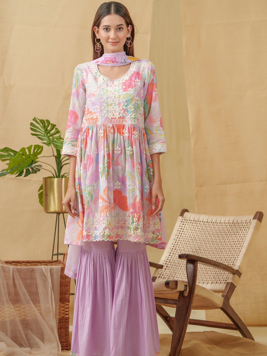 

Ishin Floral Printed Empire Thread Work Kurti with Sharara & Dupatta, Lavender