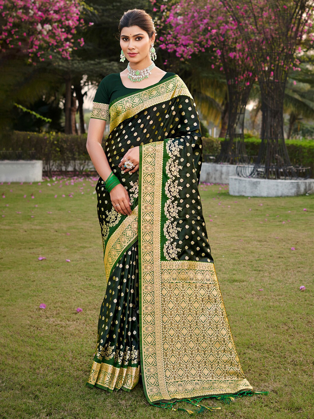 

Ishin Green Ethnic Motifs Woven Design Zari Satin Saree