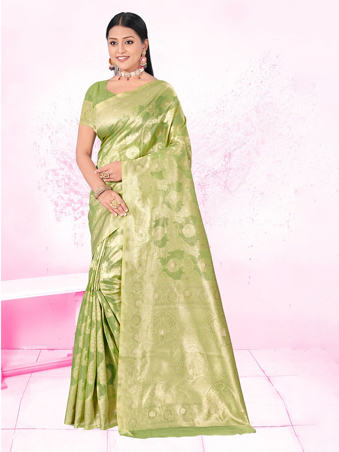 

Ishin Green Ethnic Motifs Woven Design Zari Saree