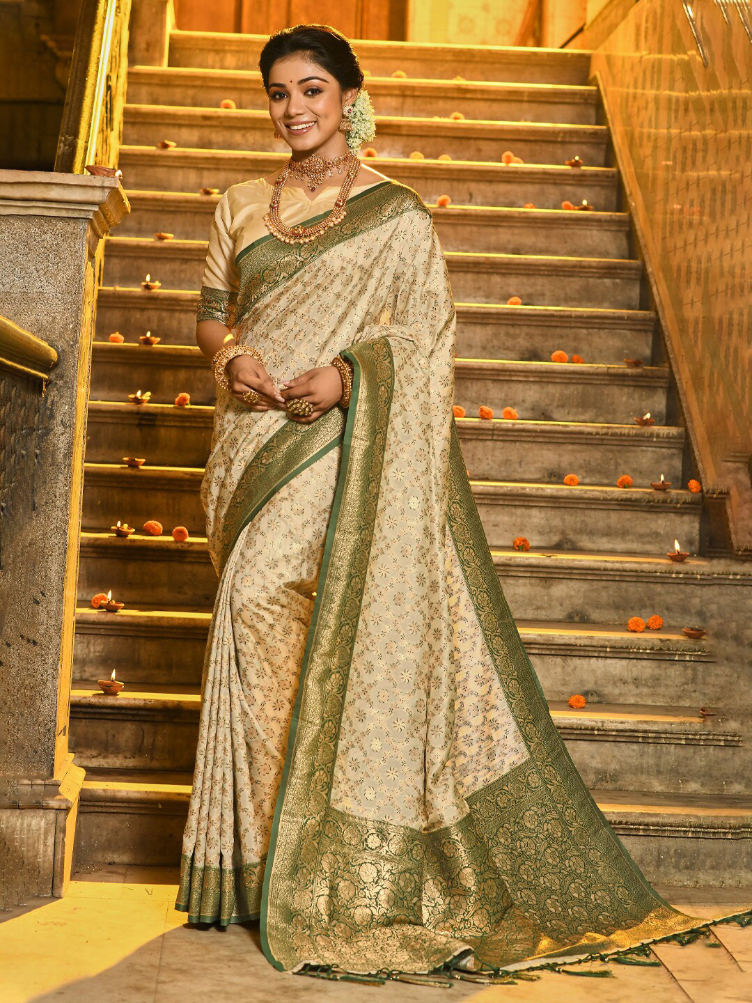 

Ishin Cream Ethnic Motifs Woven Design Zari Banarasi Saree