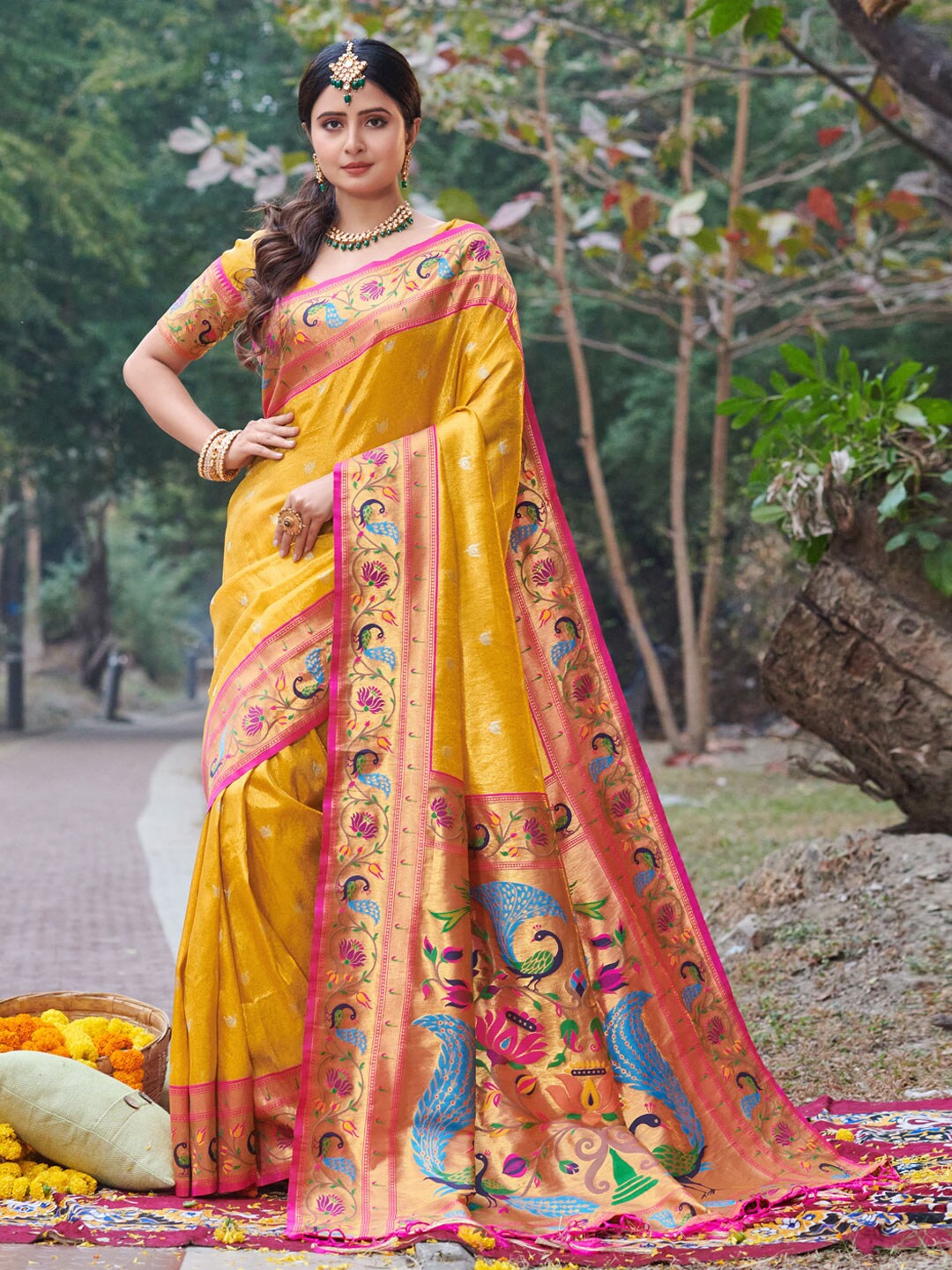

Ishin Yellow Ethnic Motifs Woven Design Zari Paithani Saree