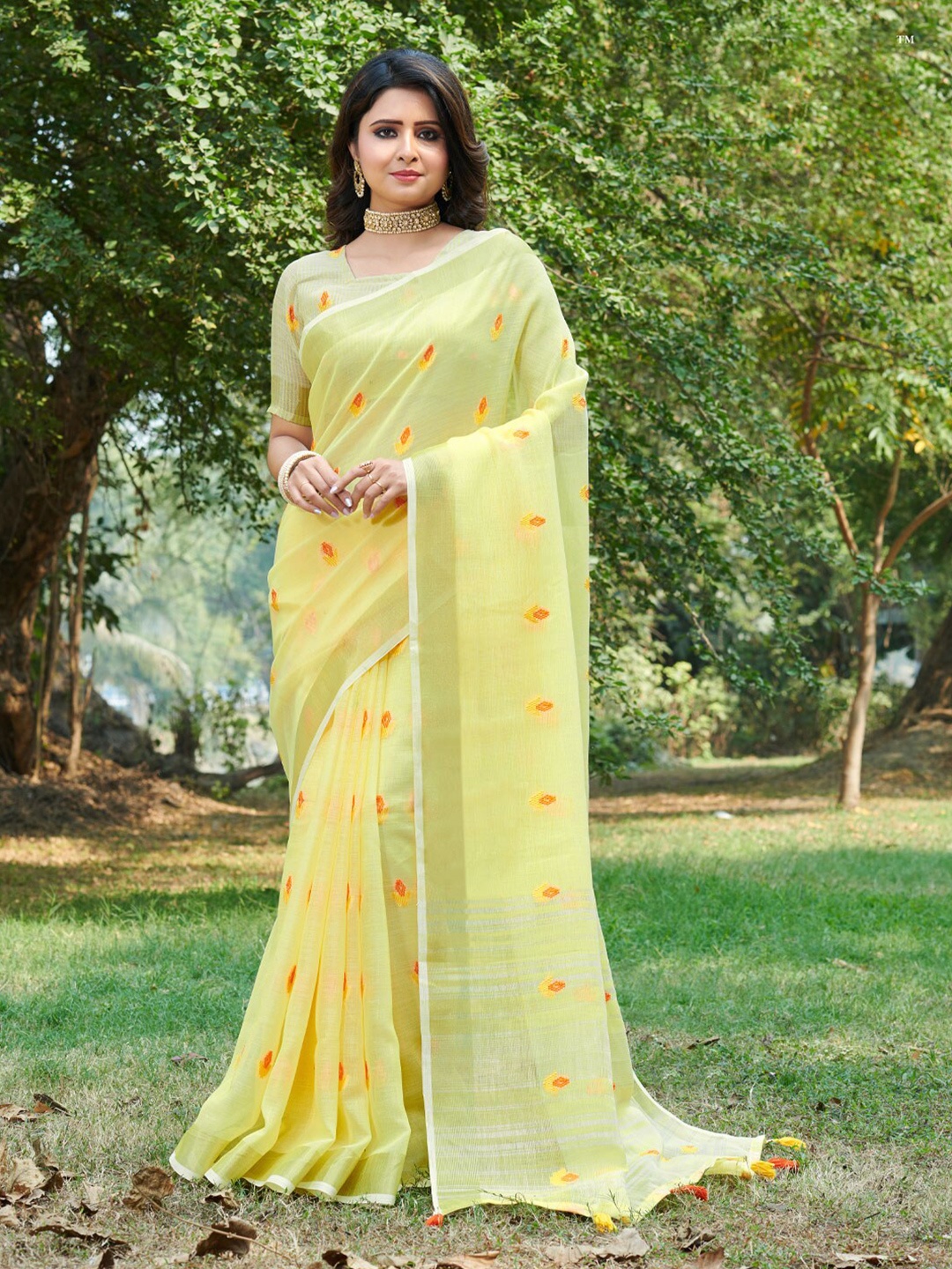 

Ishin Yellow Ethnic Motifs Woven Design Zari Saree