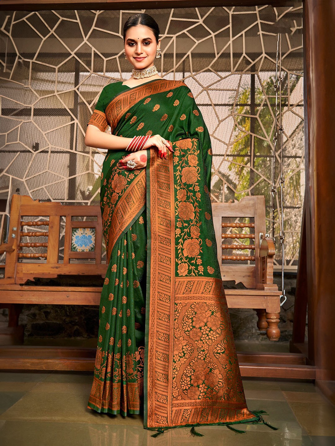 

Ishin Green Ethnic Motifs Woven Design Zari Saree