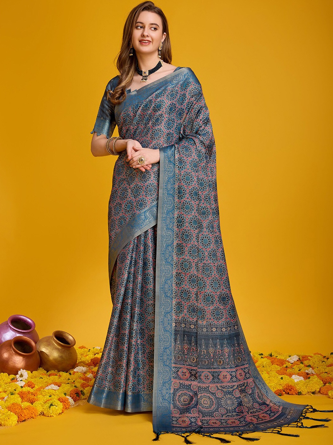 

Ishin Teal Green Geometric Printed Zari Saree