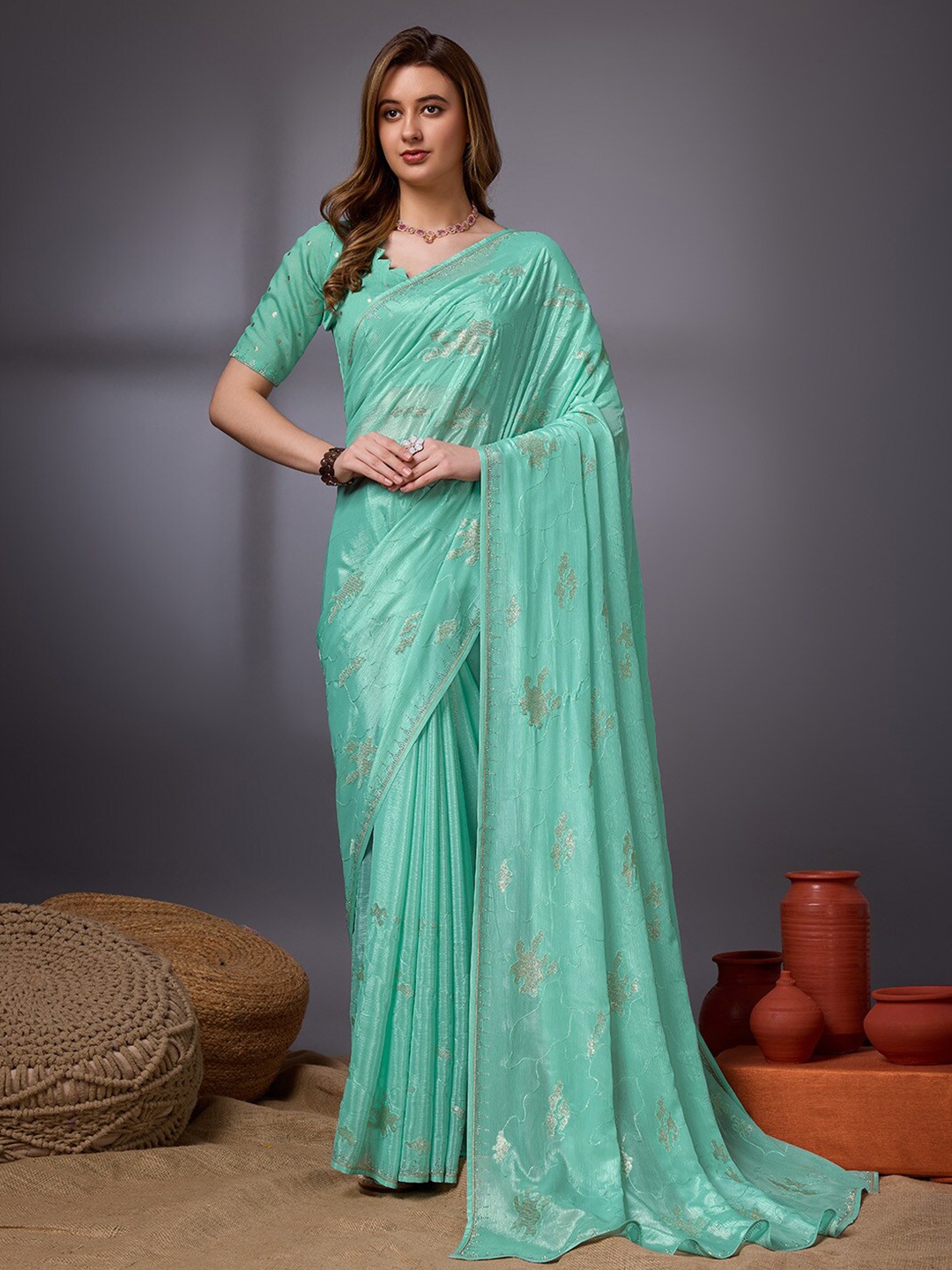 

Ishin Teal Green Abstract Embroidered Saree
