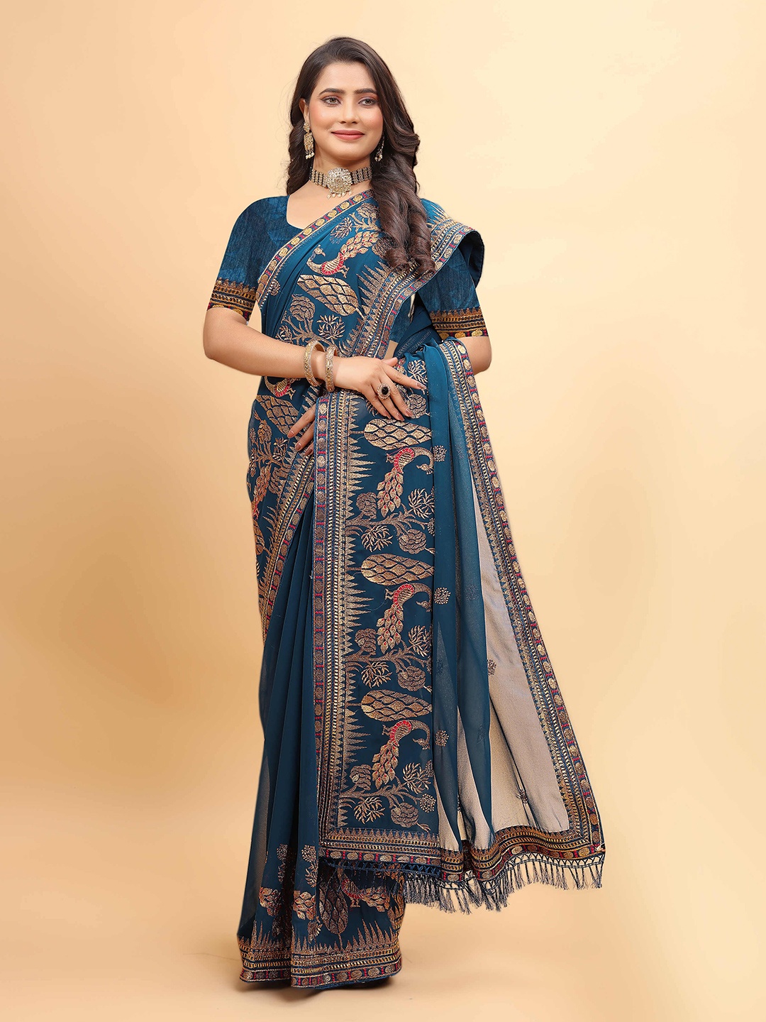 

DRIZOMIZ Paisley Embroidered Pure Georgette Ikat Saree, Teal