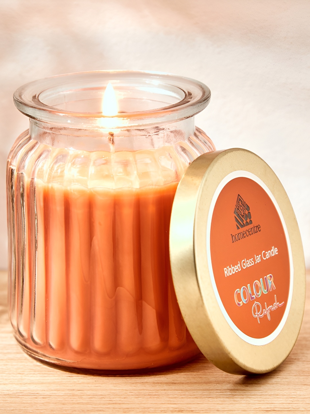 

Home Centre Orange Mandarin Scented Textured Jar Candle