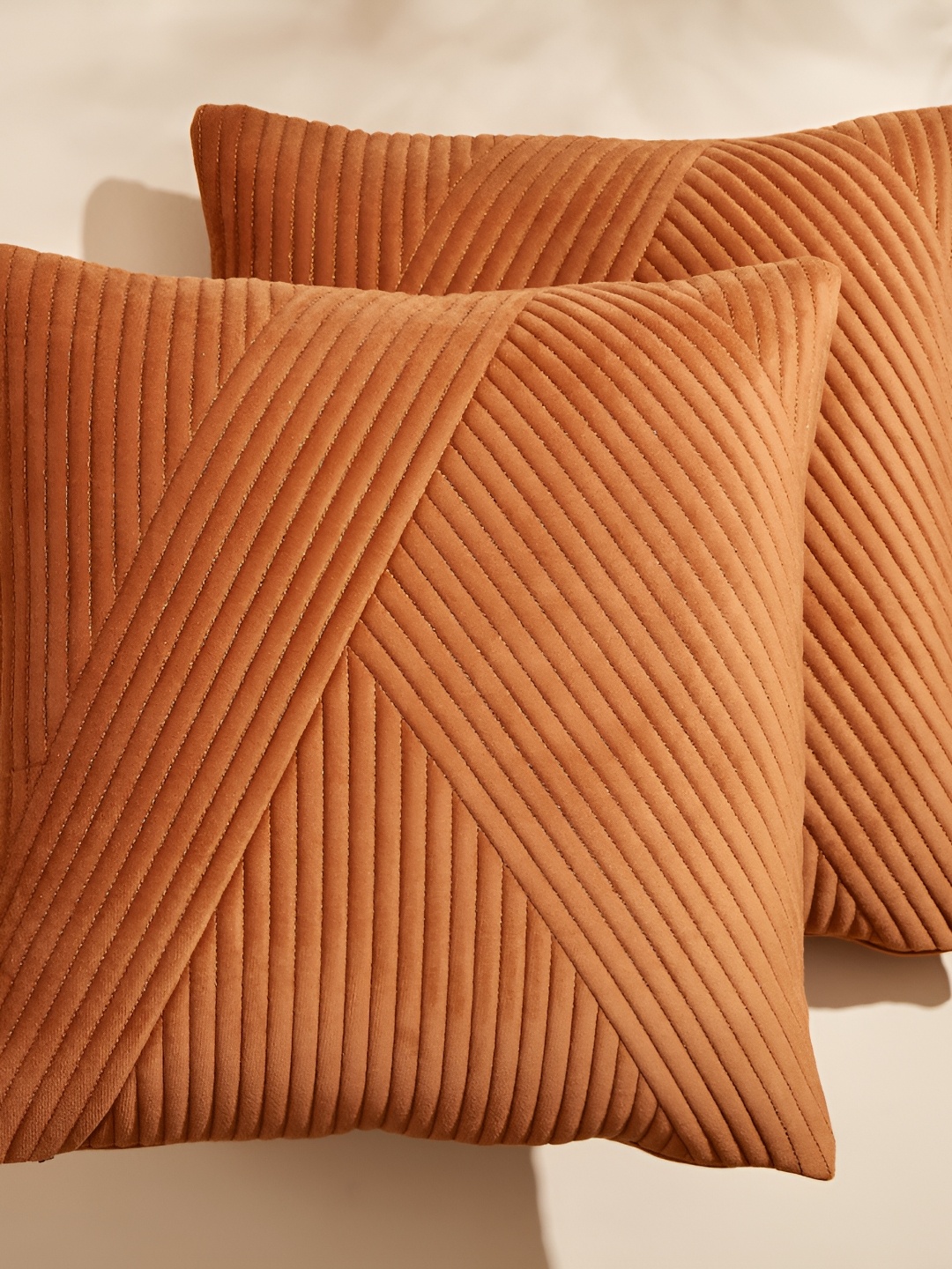 

Home Centre Brown 2 Pcs Striped Velvet Square Cushion Covers