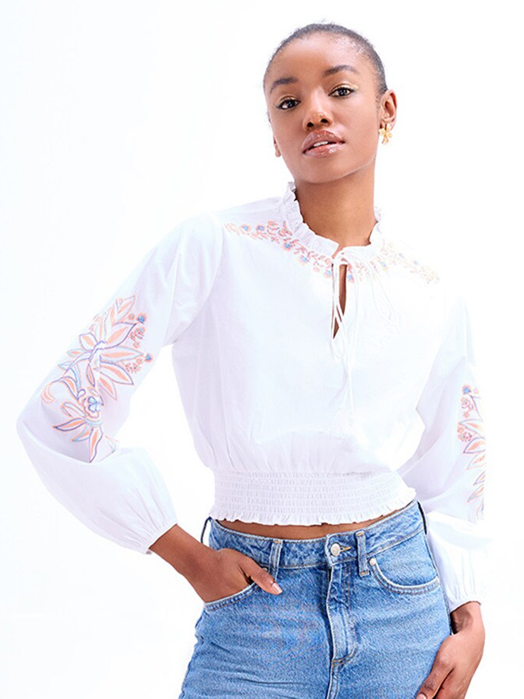 

COVER STORY Tie-Up Neck Cuffed Sleeves Embroidered Blouson Crop Top, White