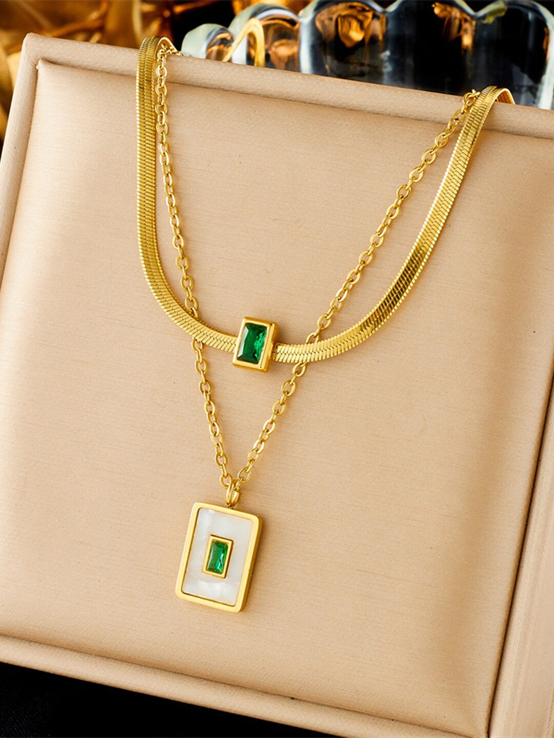 

VAGHBHATT Gold-Plated Stainless Steel Rhinestone Studded Charm Layered Necklace