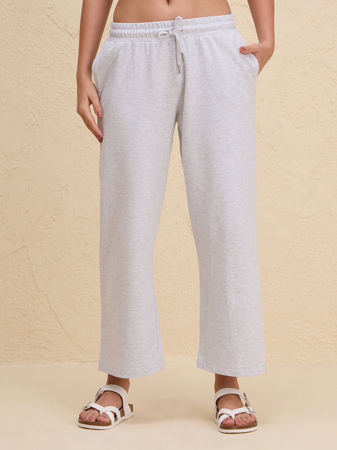 

Nykd Women Cotton Flared Fit Mid Rise Track Pants, Grey melange