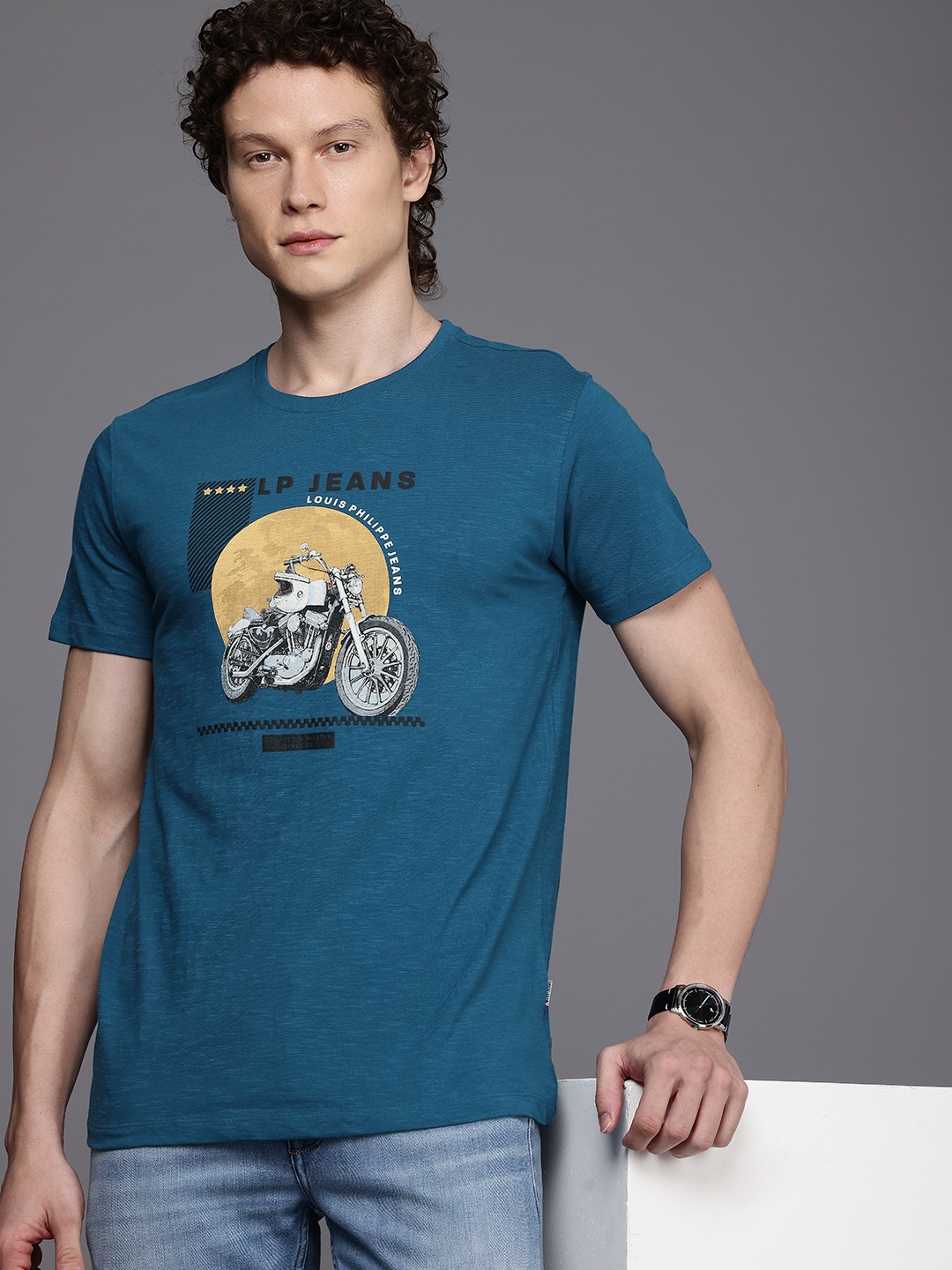 

Louis Philippe Jeans Graphic Printed Pure Cotton Slim Fit T-shirt, Teal