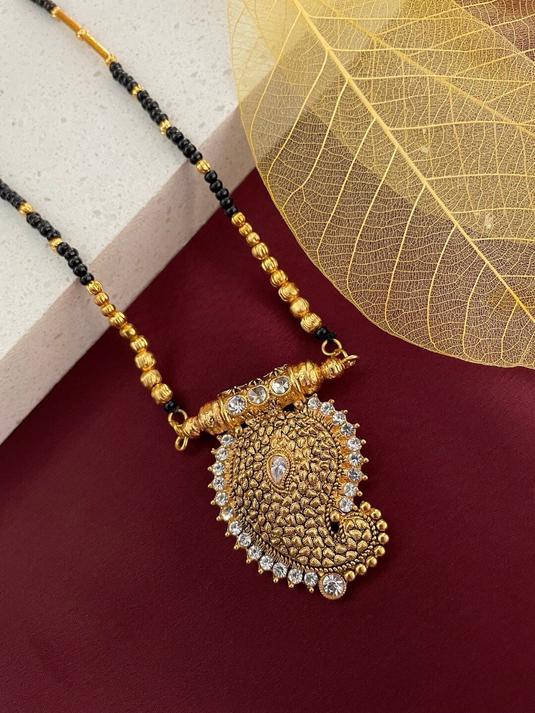 

Digital Dress Room Gold-Plated Stone Studded & Beaded Mangalsutra