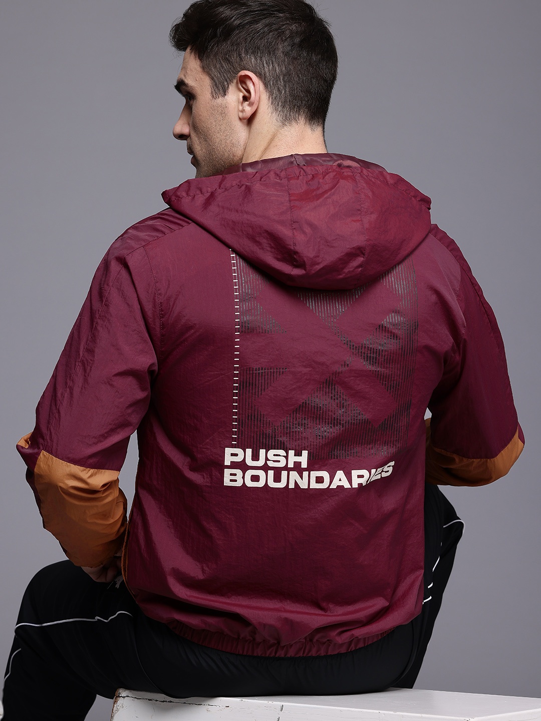 

HRX by Hrithik Roshan Colourblocked & Printed Hooded Rapid-Dry Outdoor Jacket, Maroon