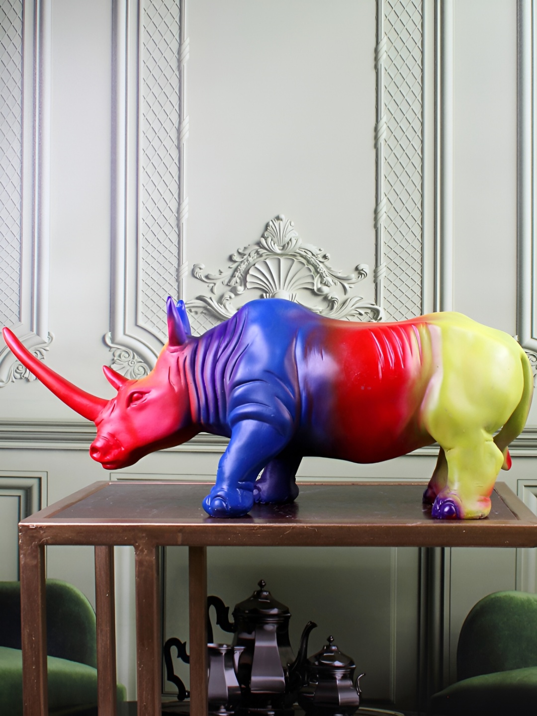 

THE WHITE INK DECOR Red & Blue Rhino Figurine Showpiece