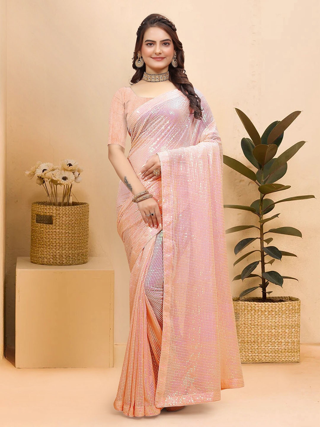 

Celeb Styles Sequinned Pure Georgette Saree, Peach