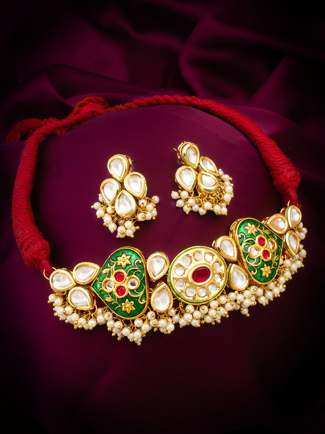 

aadita Gold-Plated Kundan Studded & Beaded Jewellery Set