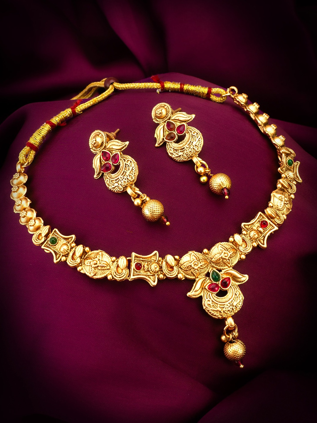 

aadita Gold-Plated Stone-Studded Jewellery Set