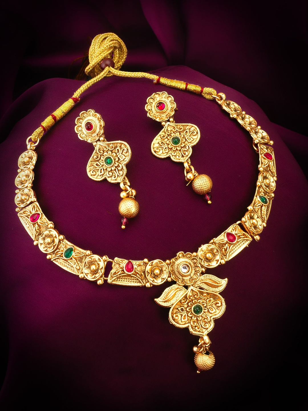 

aadita Gold-Plated Stone Studded Jewellery Set