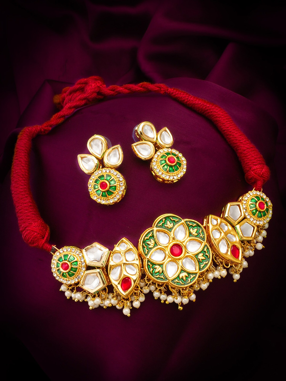 

aadita Gold-Plated Kundan Stone Studded & Beaded Jewellery Set