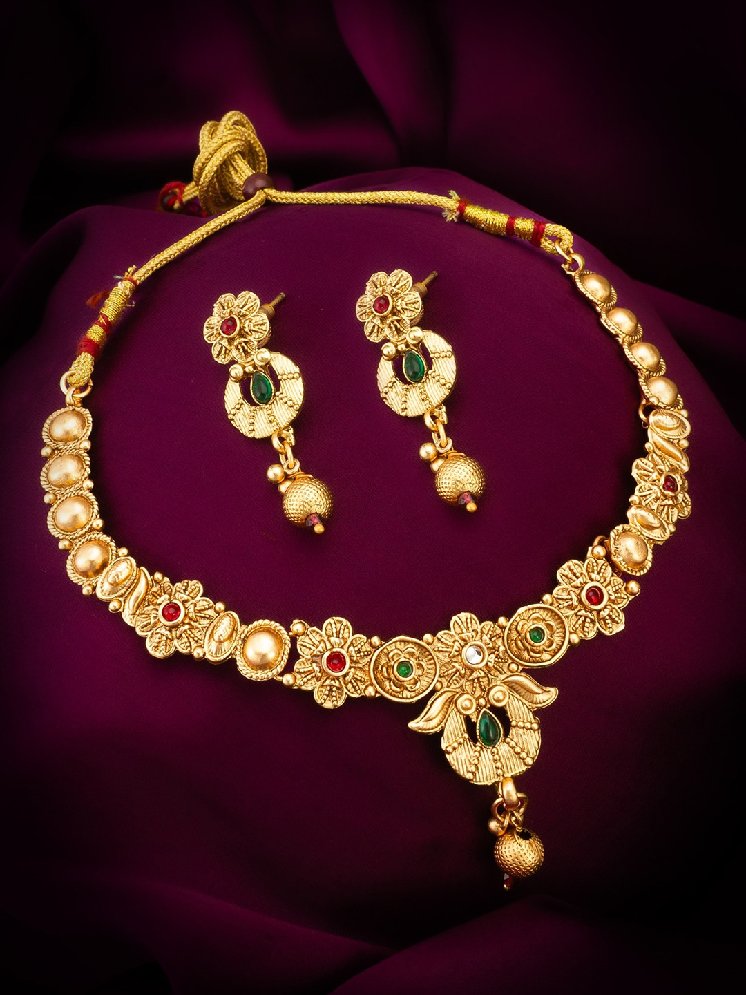

aadita Gold-Plated Stones Studded Jewellery Set