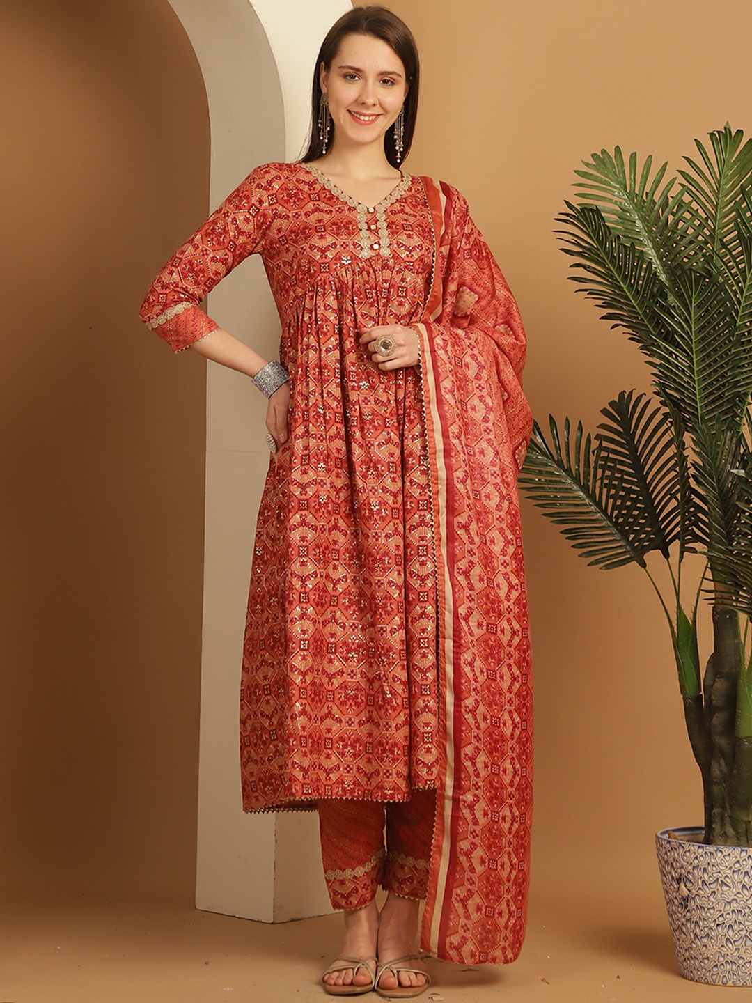 

Rajnandini V Neck Floral Printed Empire Kurta with Trouser & Dupatta, Orange