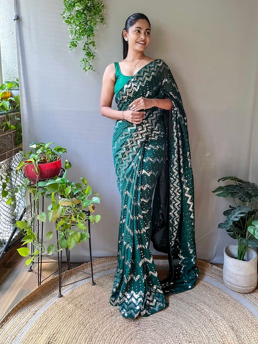 

Mitera Green Embellished Sequinned Saree