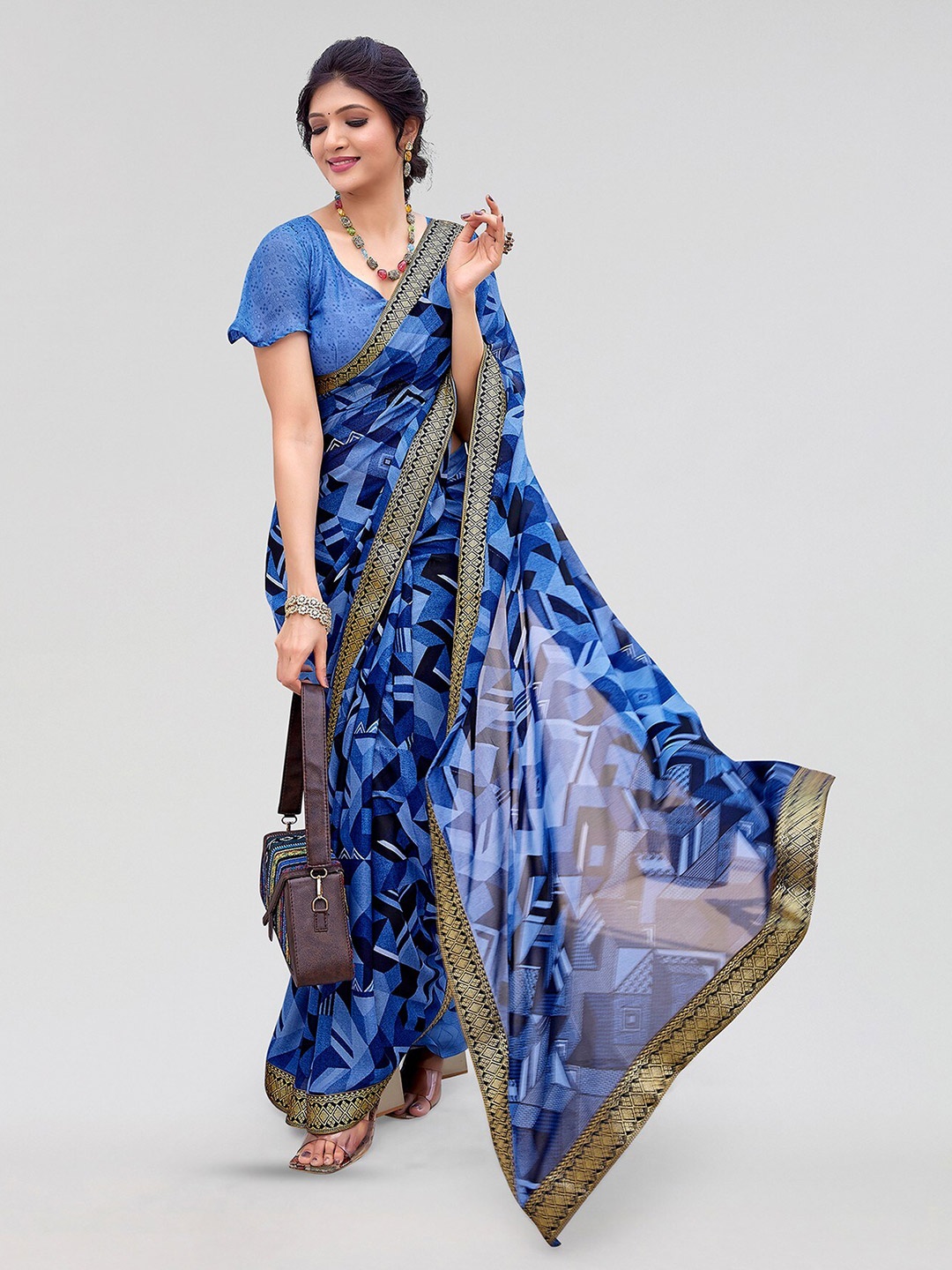 

Yashika Geometric Printed Bandhani Saree, Blue