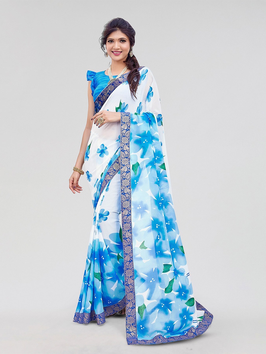 

Yashika Floral Printed Saree, Blue