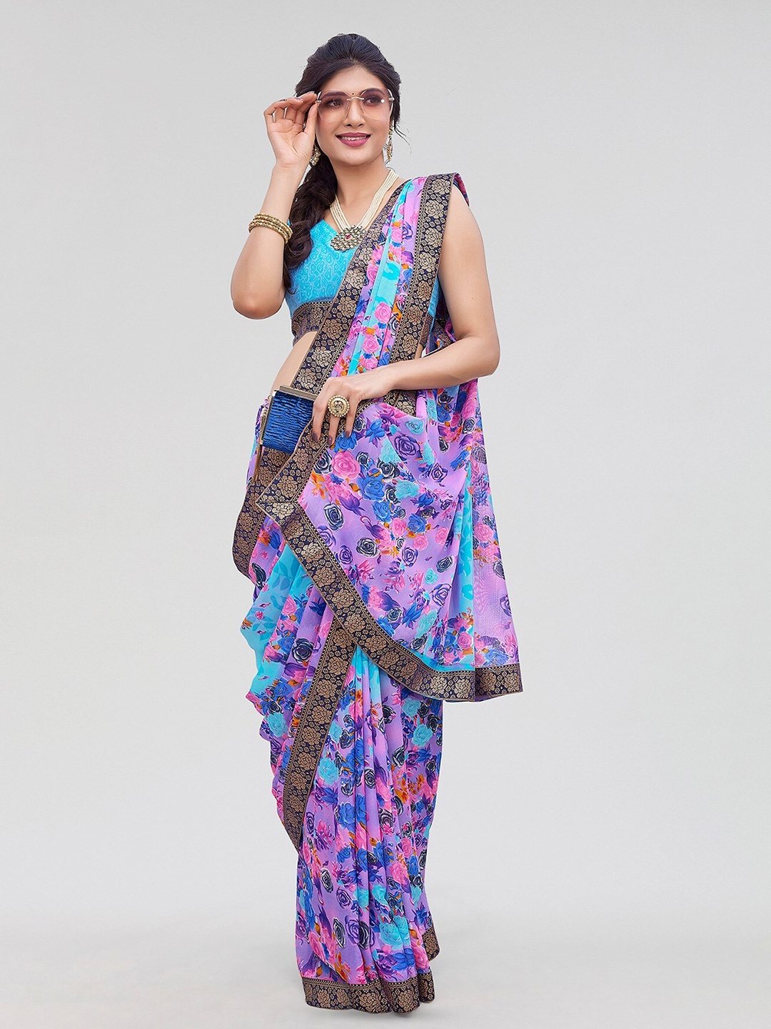 

Yashika Floral Printed Zari Saree, Blue