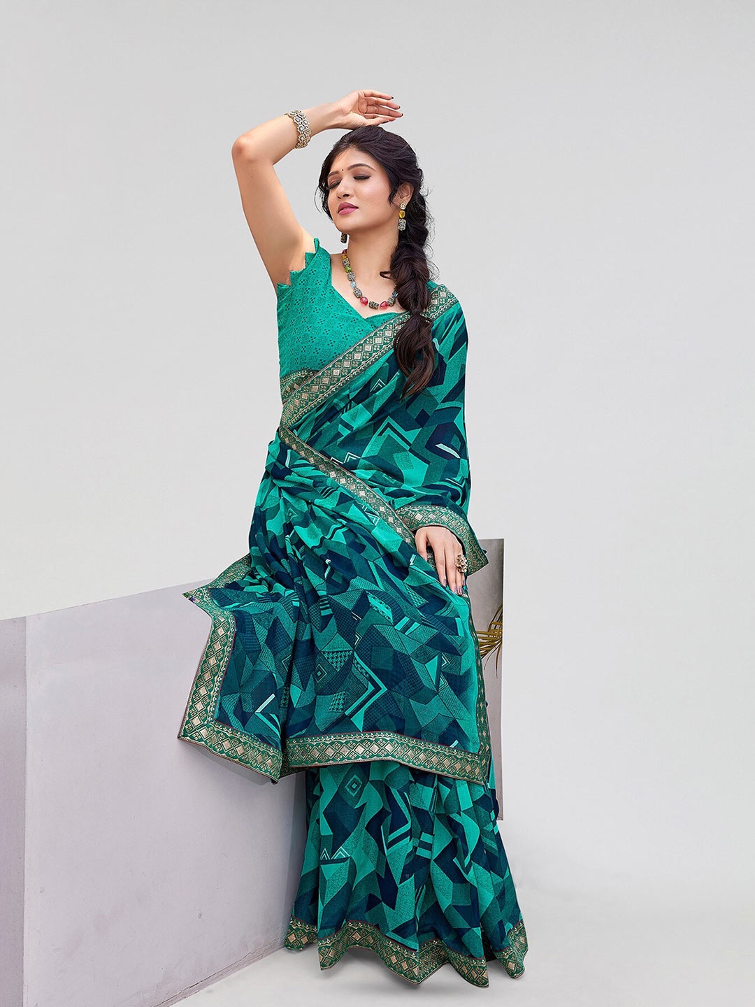 

Yashika Abstract Printed Zari Saree, Teal