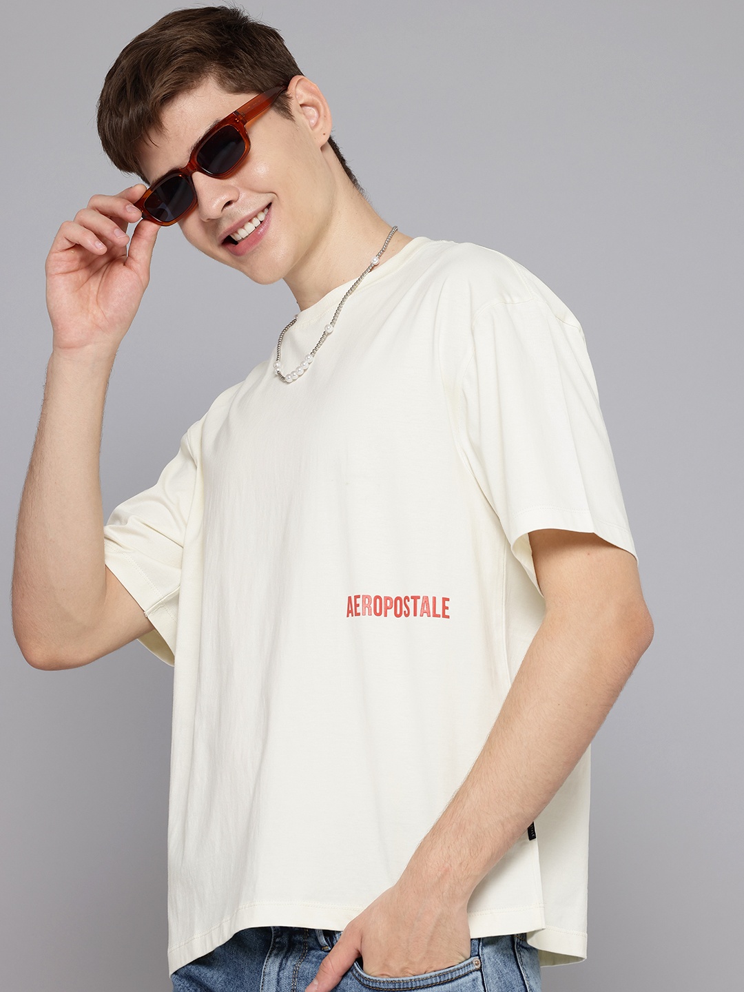 

Aeropostale Men Drop-Shoulder Sleeves Pure Cotton Relaxed Fit T-shirt, Off white