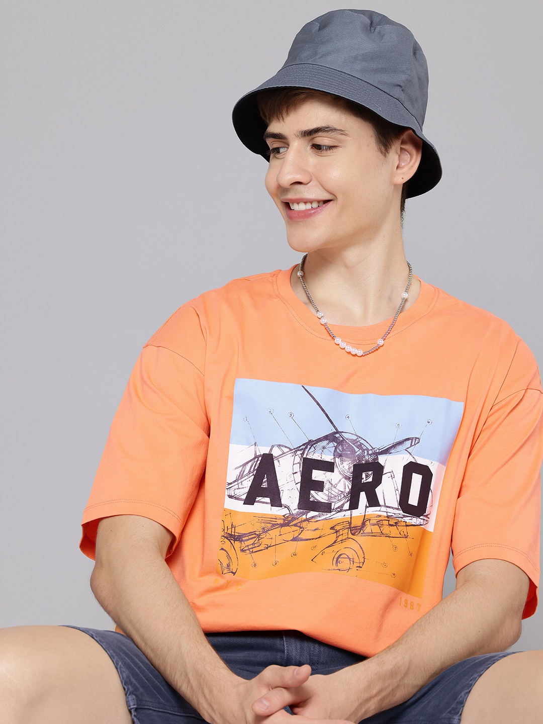 

Aeropostale Men Brand Logo Printed Pure Cotton Relaxed Fit T-shirt, Orange