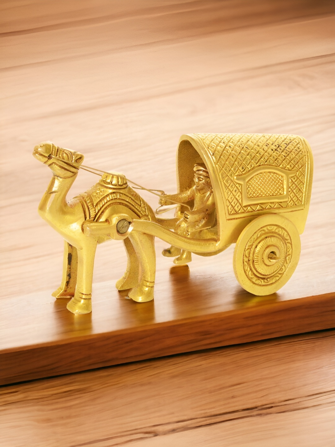 

Aakrati Yellow Brass Figurine Showpiece