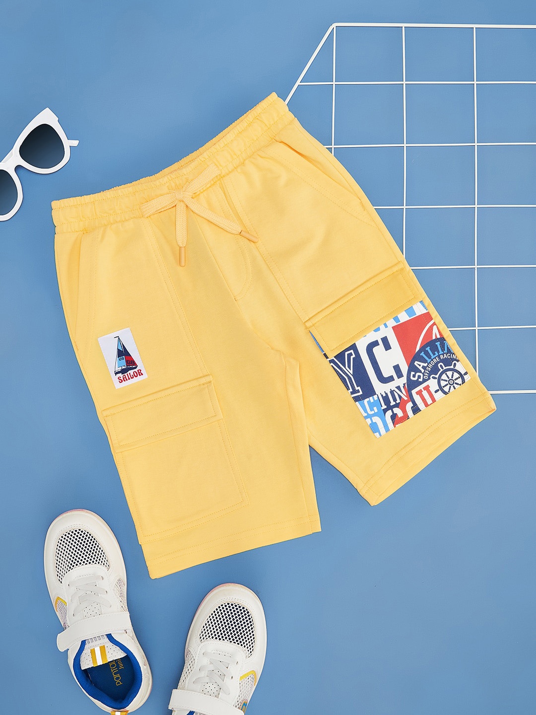 

Pantaloons Junior Boys Printed Cotton Shorts, Yellow