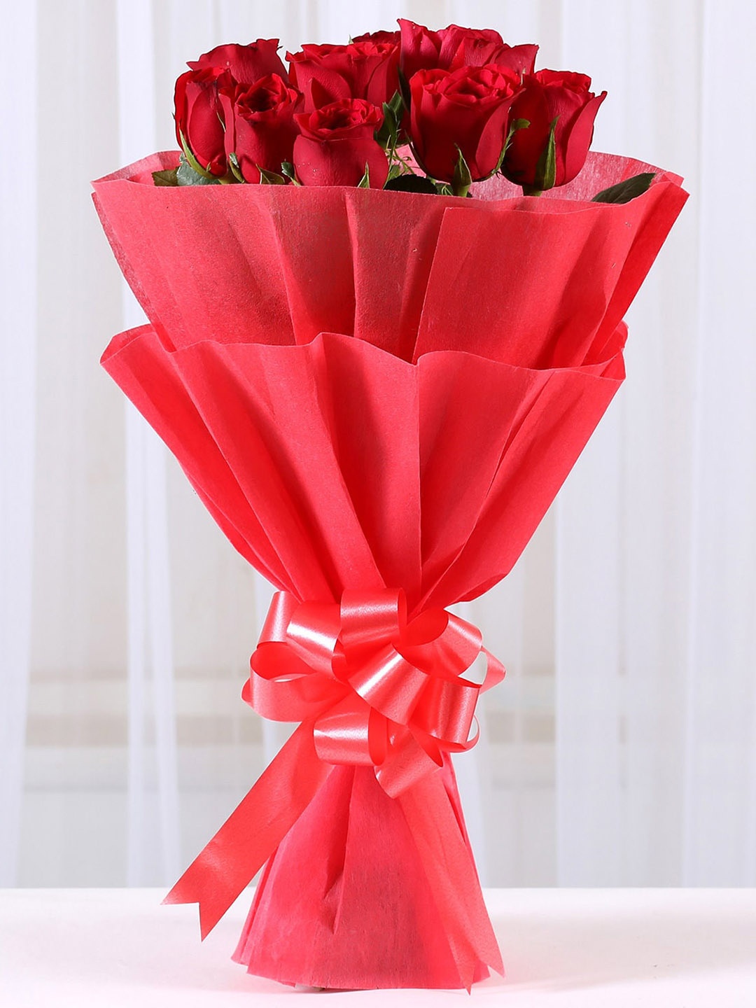 

fnp Vivid 10-Red Roses Fresh Flowers Bouquet