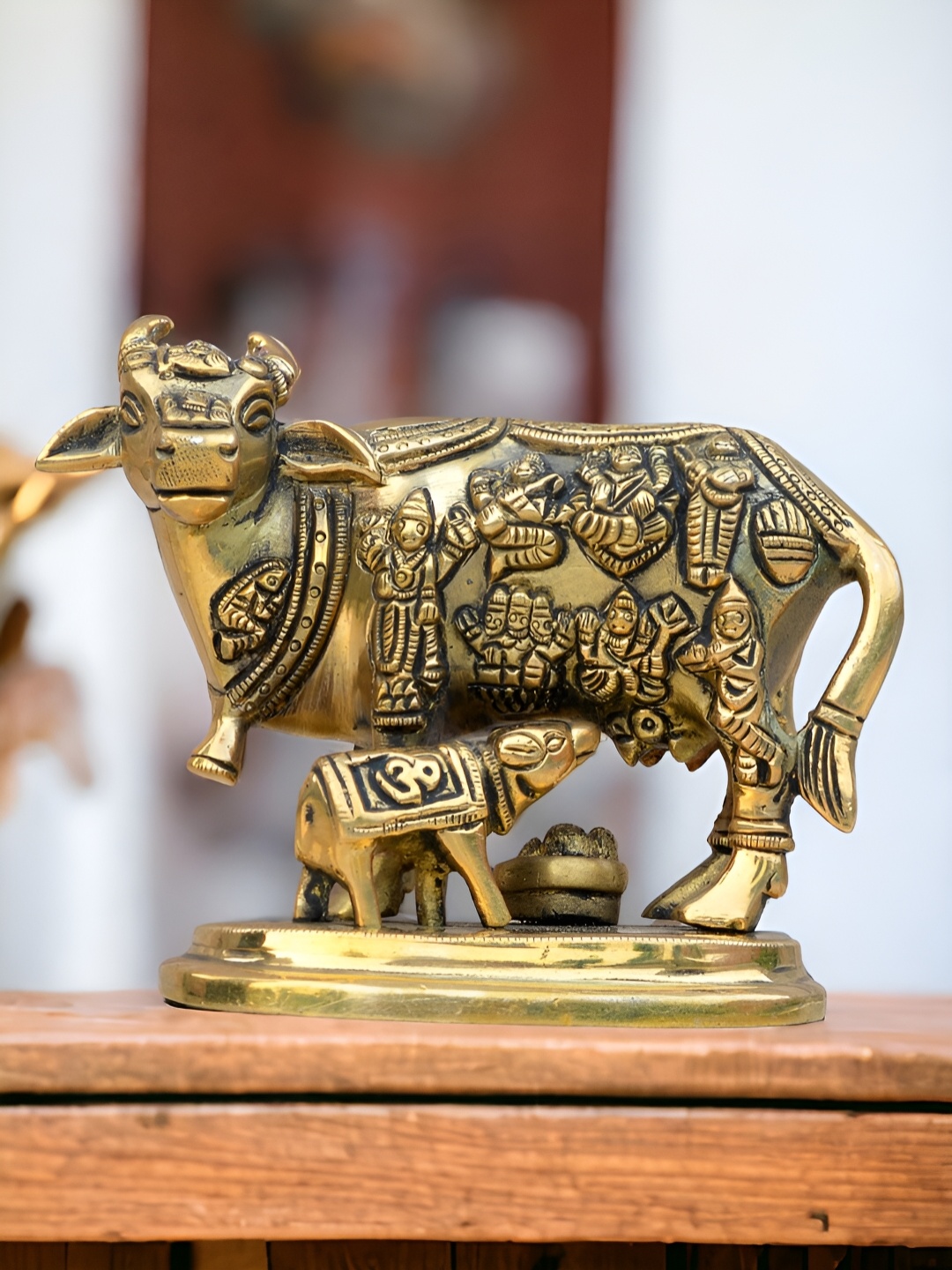 

Aakrati Yellow Brass Religious Figurine Showpiece