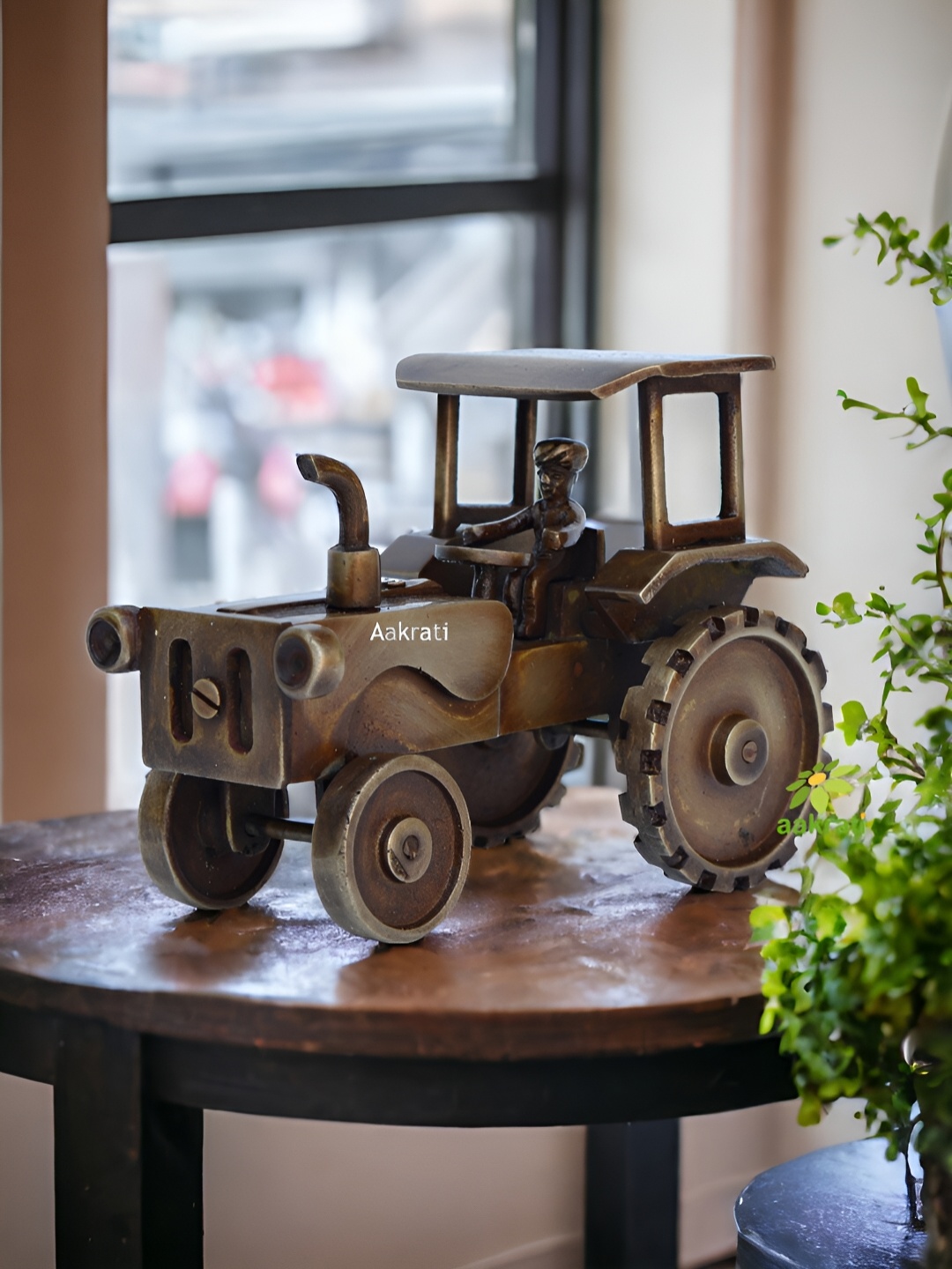 

Aakrati Yellow Tractor decorative Showpiece