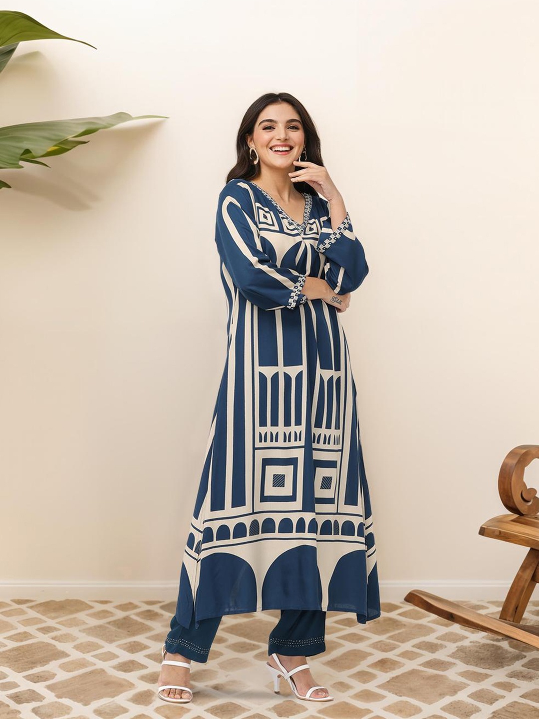 

Ishin Geometric Quirky Printed A- Line Kurta and Pants with Embroidered Hem, Blue