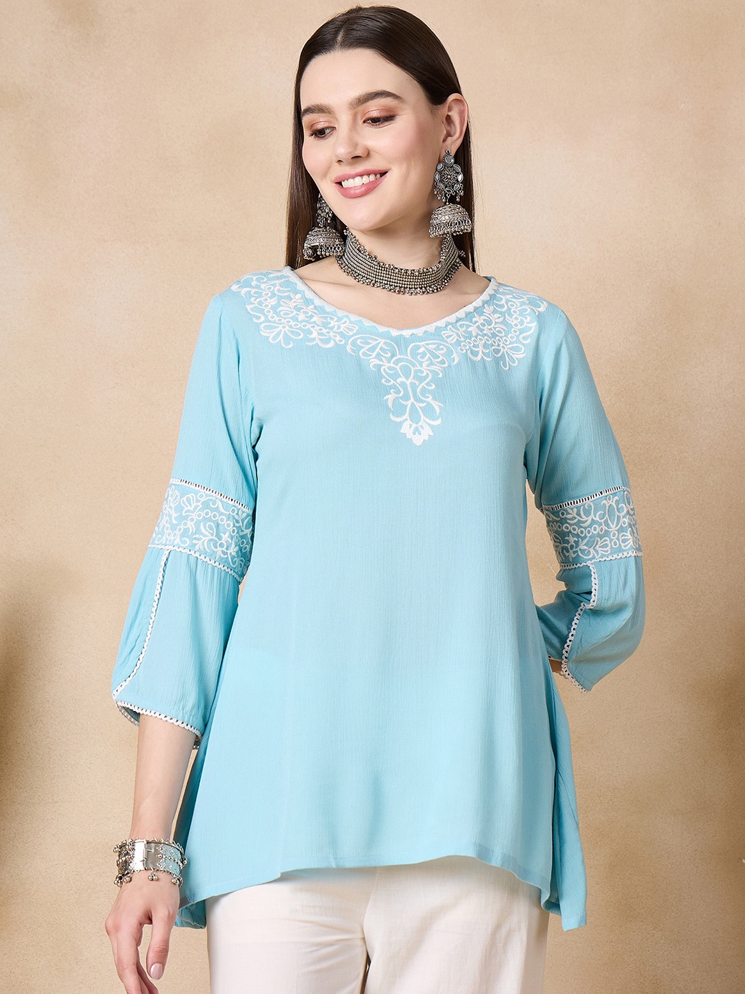 

Anouk Women Yoke Design Flared Sleeves Thread Work Kurta, Blue