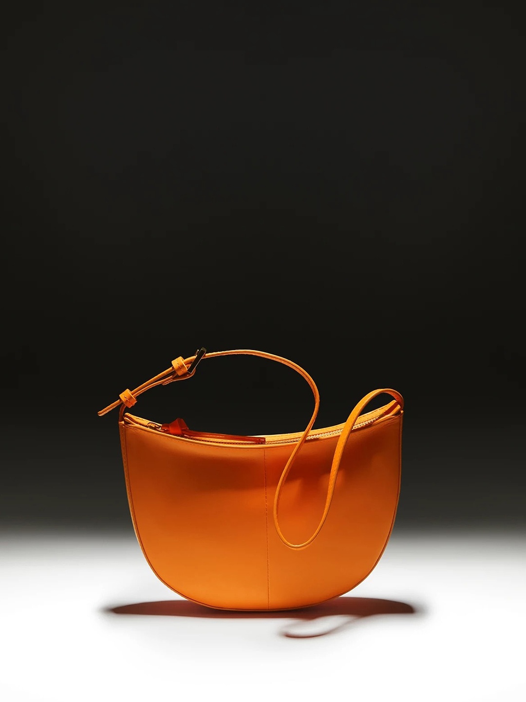 

Marks & Spencer Leather Structured Handheld Bag with Cut Work, Orange