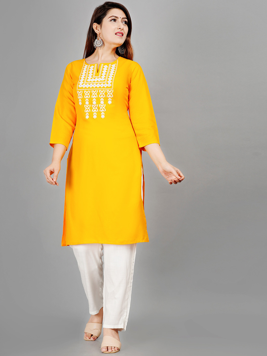 

SIPET Ethnic Motifs Yoke Design Thread Work Straight Kurta With Trousers, Yellow